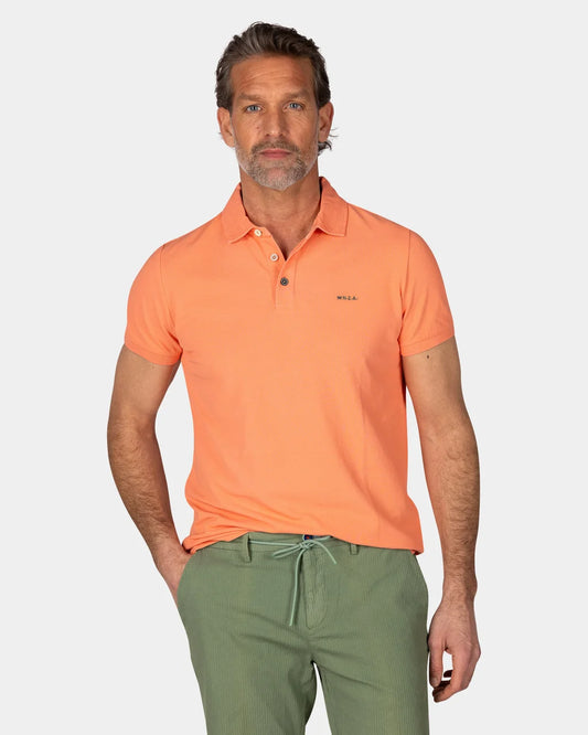 Polo uni en coton corail